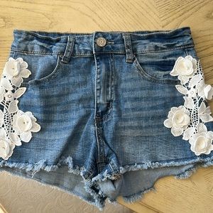 Indigo Rein - Blue Jean Cut Off Shorts with Embroidered Floral Embellishments. 7